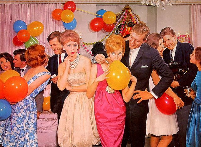 A Norman Rockwell illustration of 1950's party: a man is holding his cigarette close to a ballon while a woman watches on with scorn.