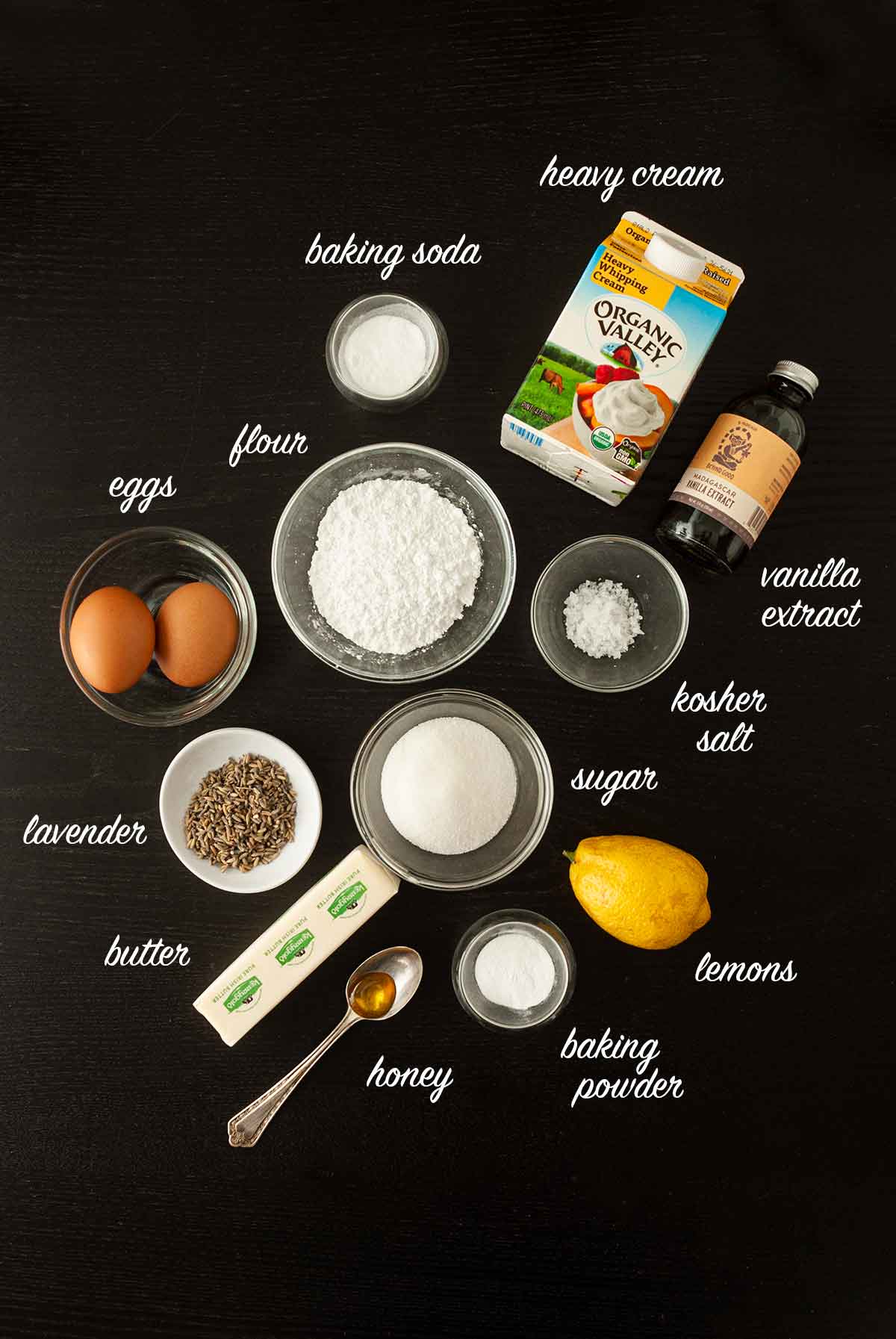 Ingredients on a table that make lavender lemon scones.