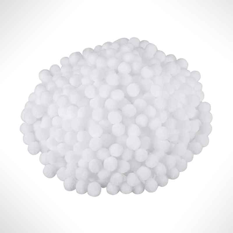 A pile of white craft pompoms.