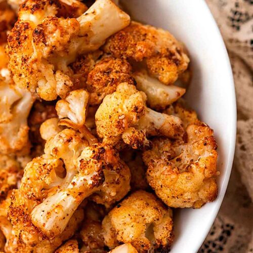 A bowl of roasted cauliflower.