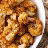 A bowl of roasted cauliflower.