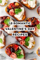 Ornate appetizers on marble with a title that says "15 Romantic Valentine's Day Recipes."