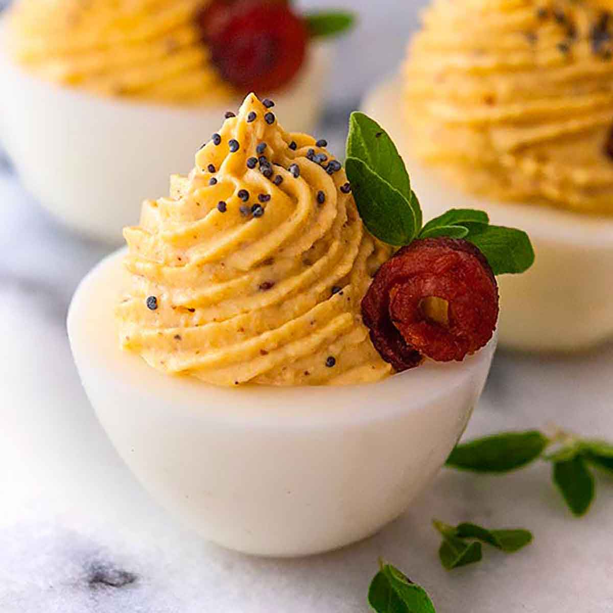 https://www.shekeepsalovelyhome.com/wp-content/uploads/2021/01/Deviled-Eggs-with-Bacon-Roses-thumbnail-square.jpg