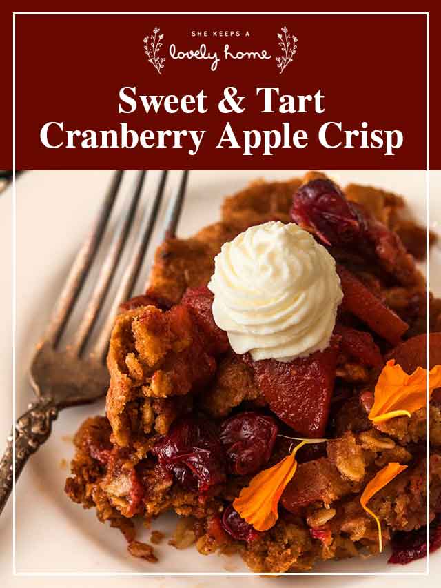 Cranberry apple crisp on a plate with a title that says "Sweet and Tart Cranberry Apple Crisp."