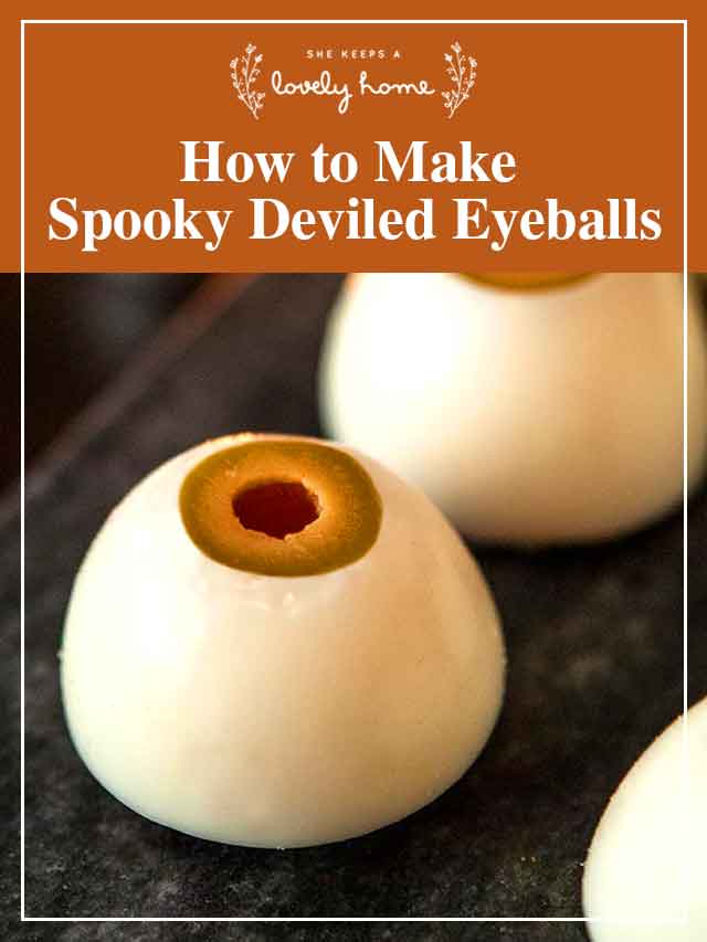 Deviled eye balls on a slate with a title that says "How to Make Spooky Deviled Eyeballs."