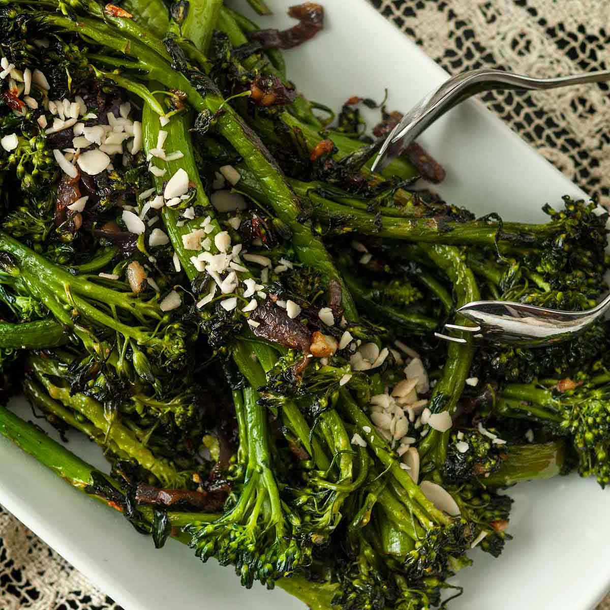 Sautéed broccoli rabe on a plate.