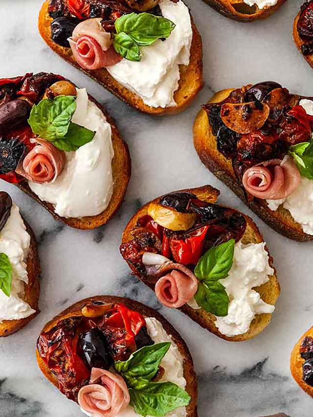 6 tomato bruschetta on marble.