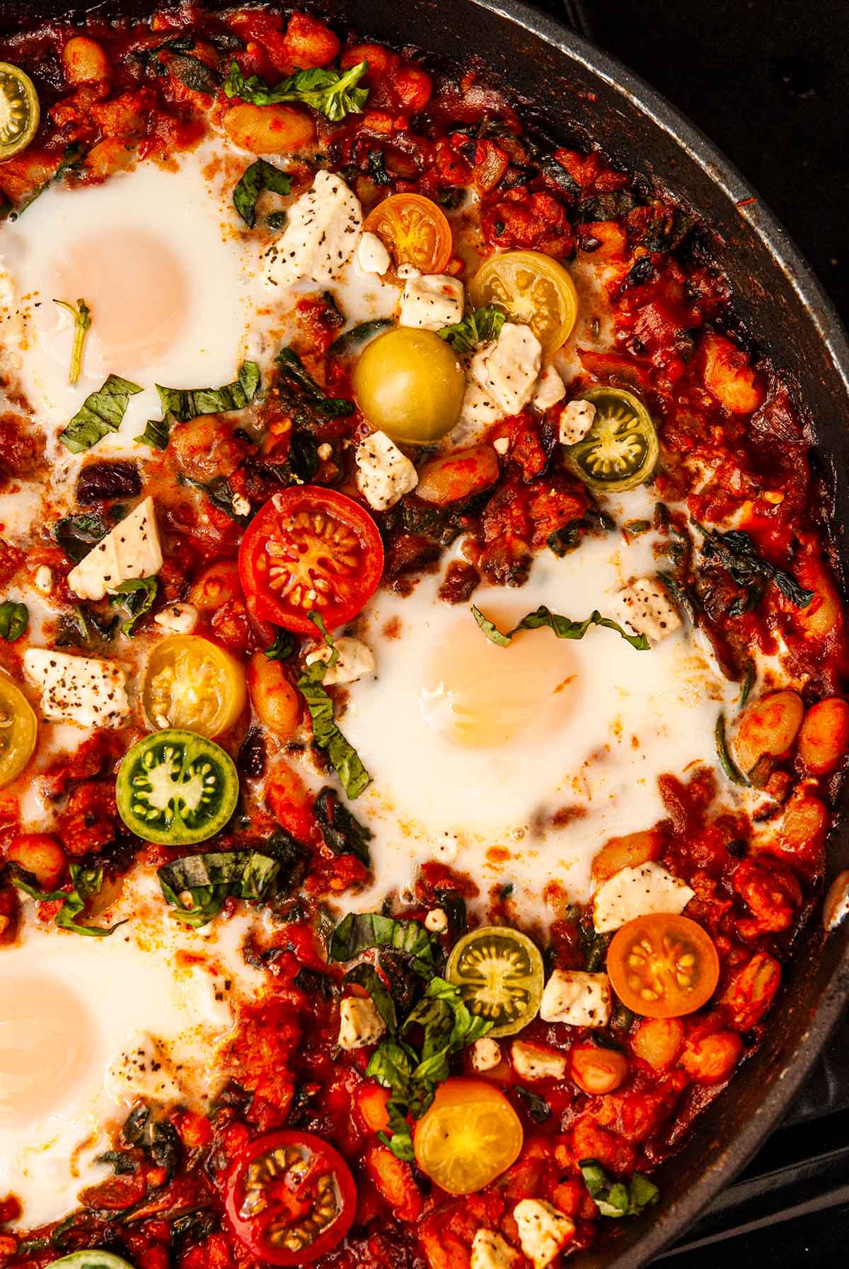 Italian Eggs in Purgatory in a pan on stovetop.