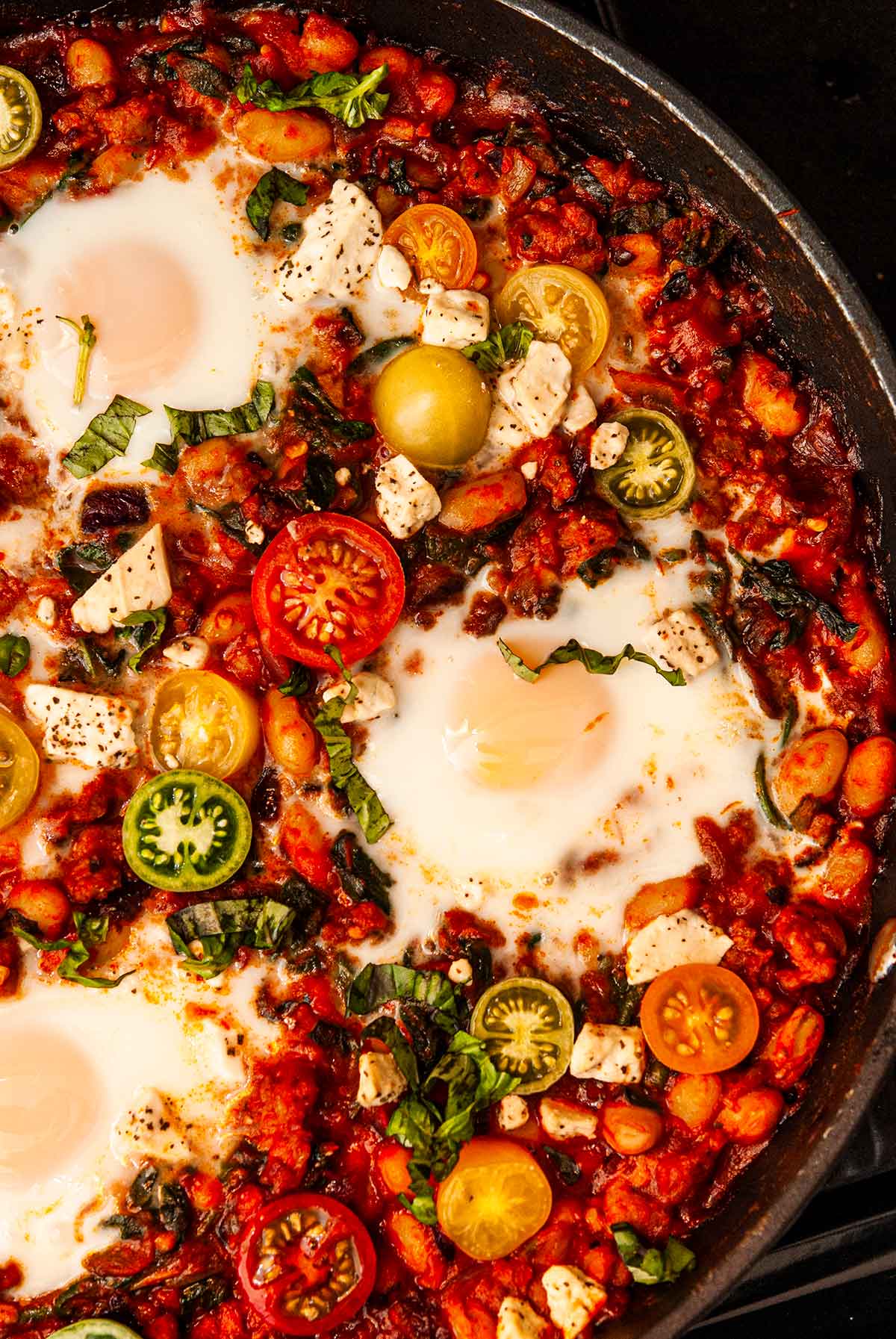 Italian Eggs in Purgatory in a pan on stovetop.