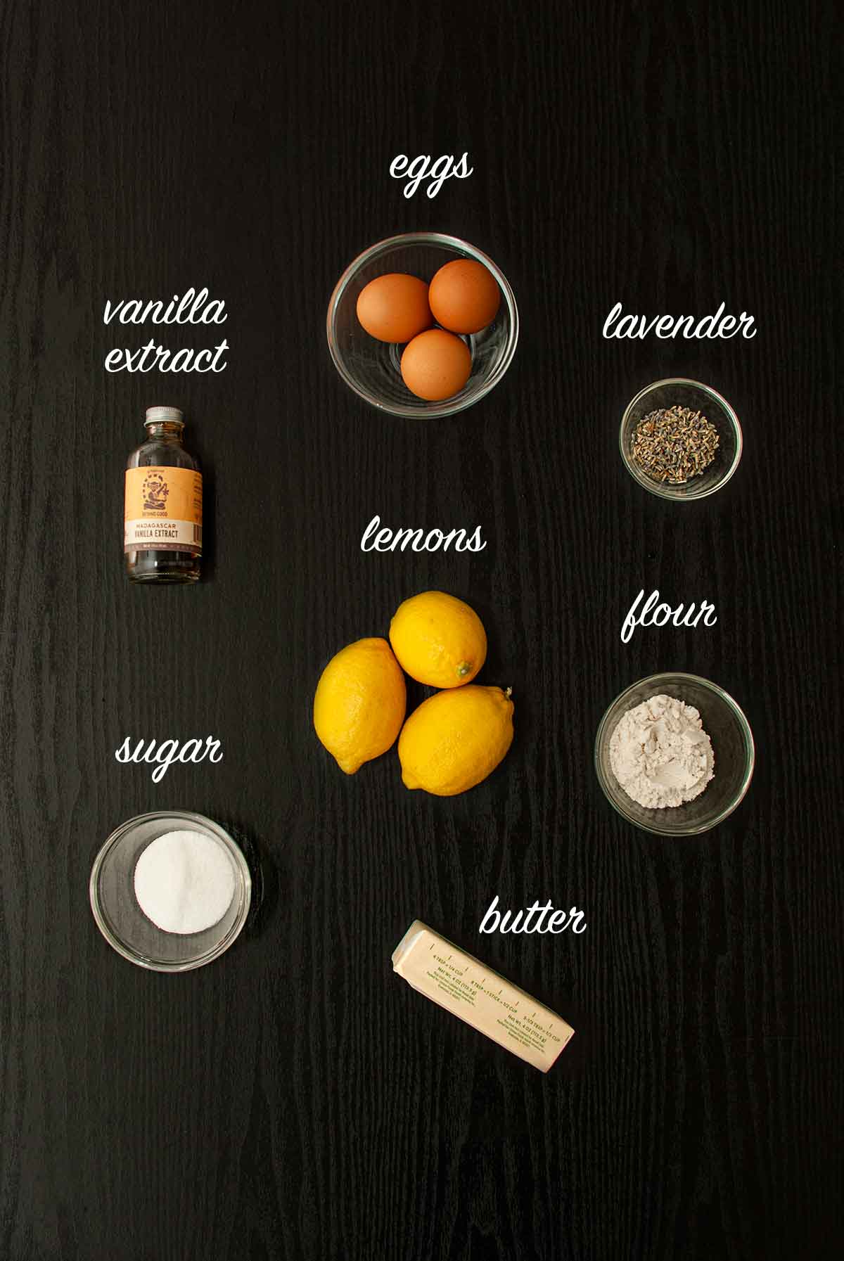 7 ingredients on a tables with lables describing what they are.