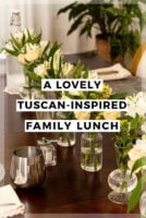 Flowers on a dinner table with a title that says "A Lovely Tuscan-Inspired Family Lunch."
