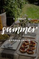 A set table in a garden with a title that says "A Lovely Summer Garden Lunch."