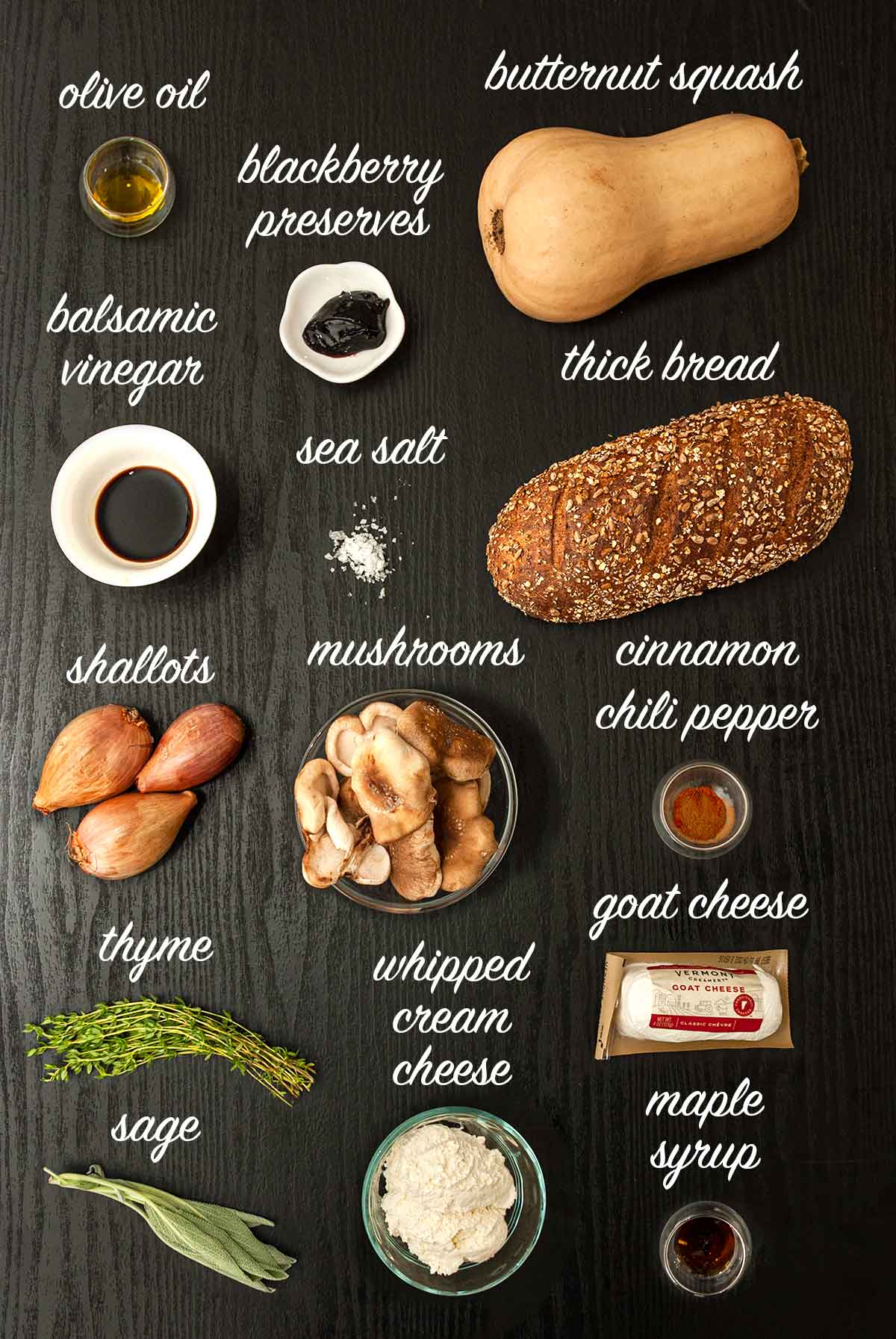 14 ingredients on a table with text labels describing what they are.