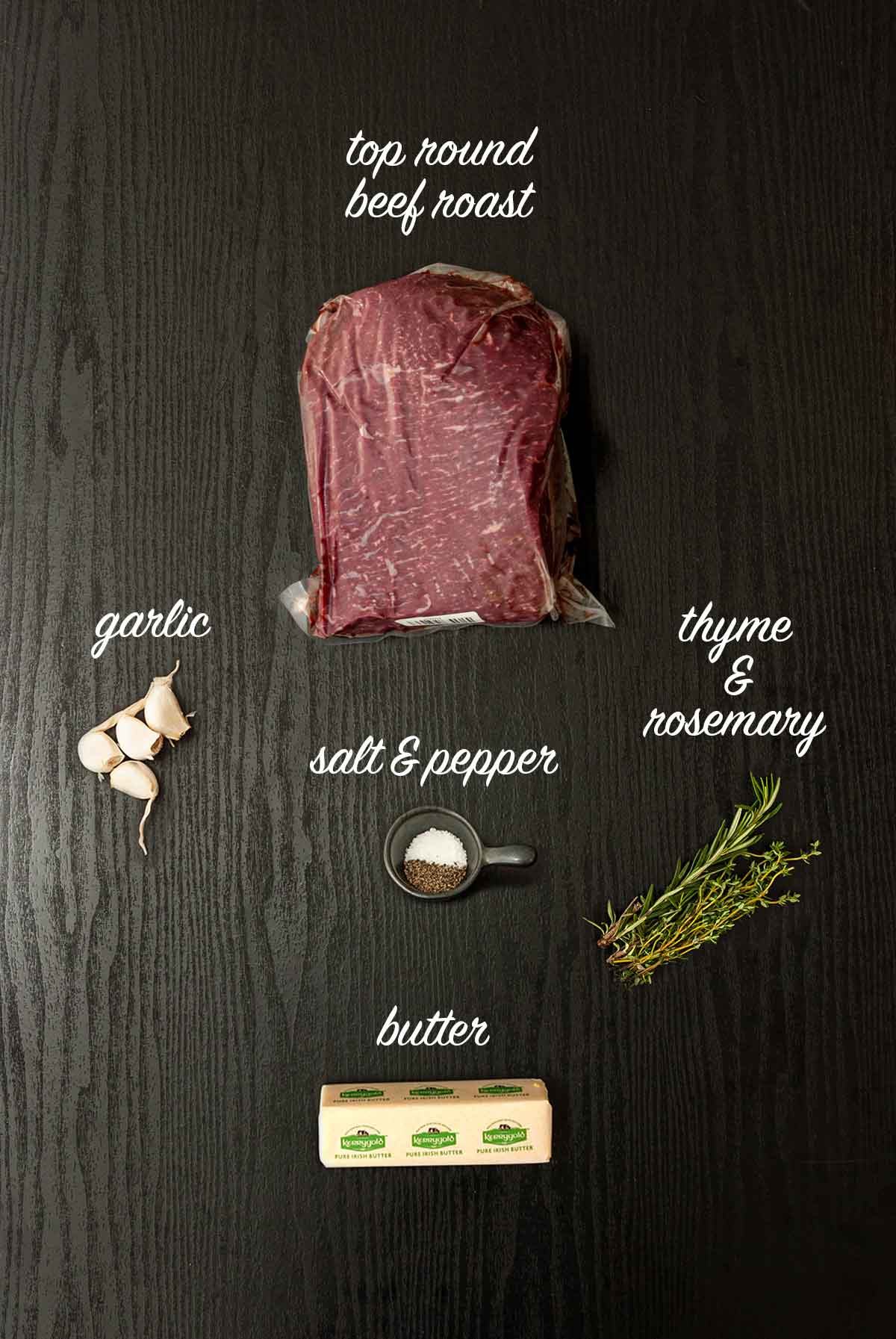 5 ingredients on a table for making top round roast beef with labels.