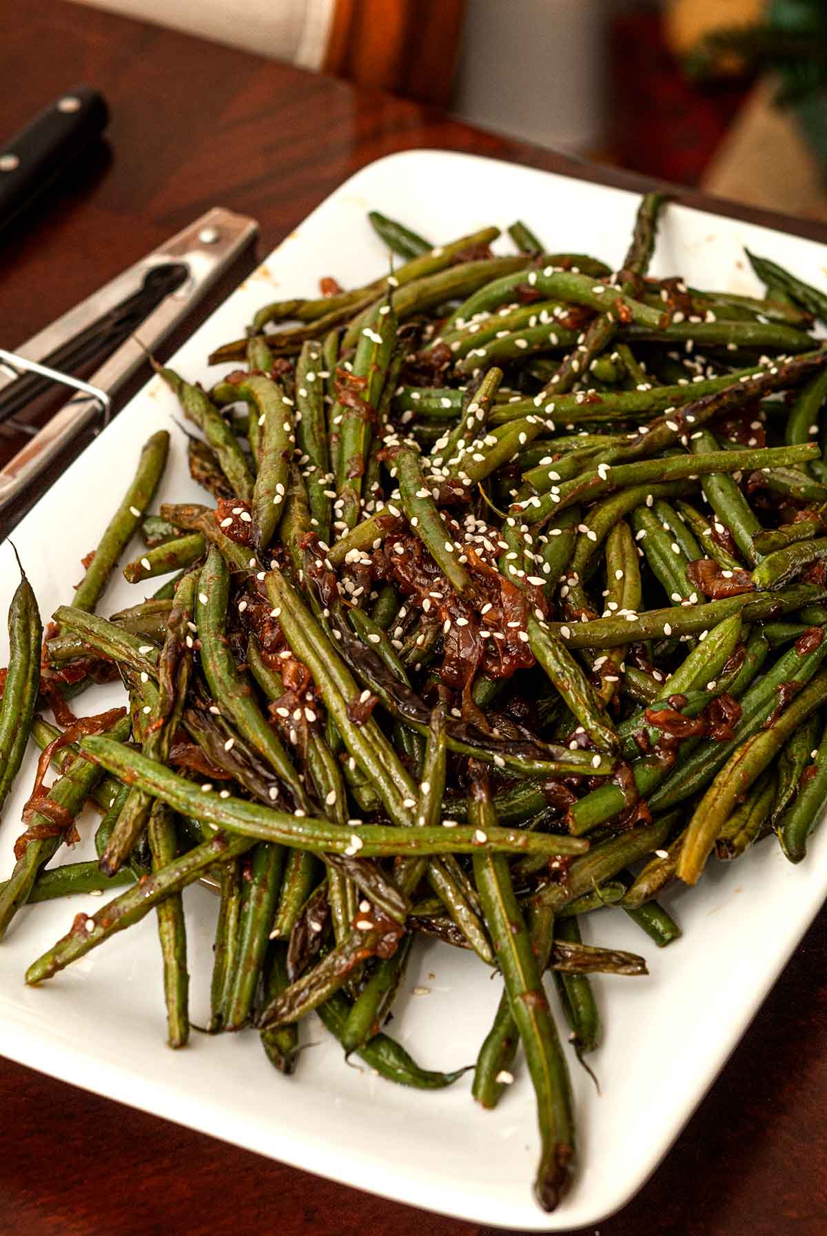 A large plate of sesame ginger beans.