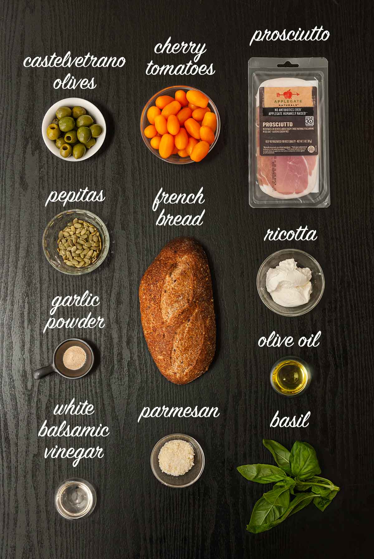 11 ingredients on a table with labels describing what they are.