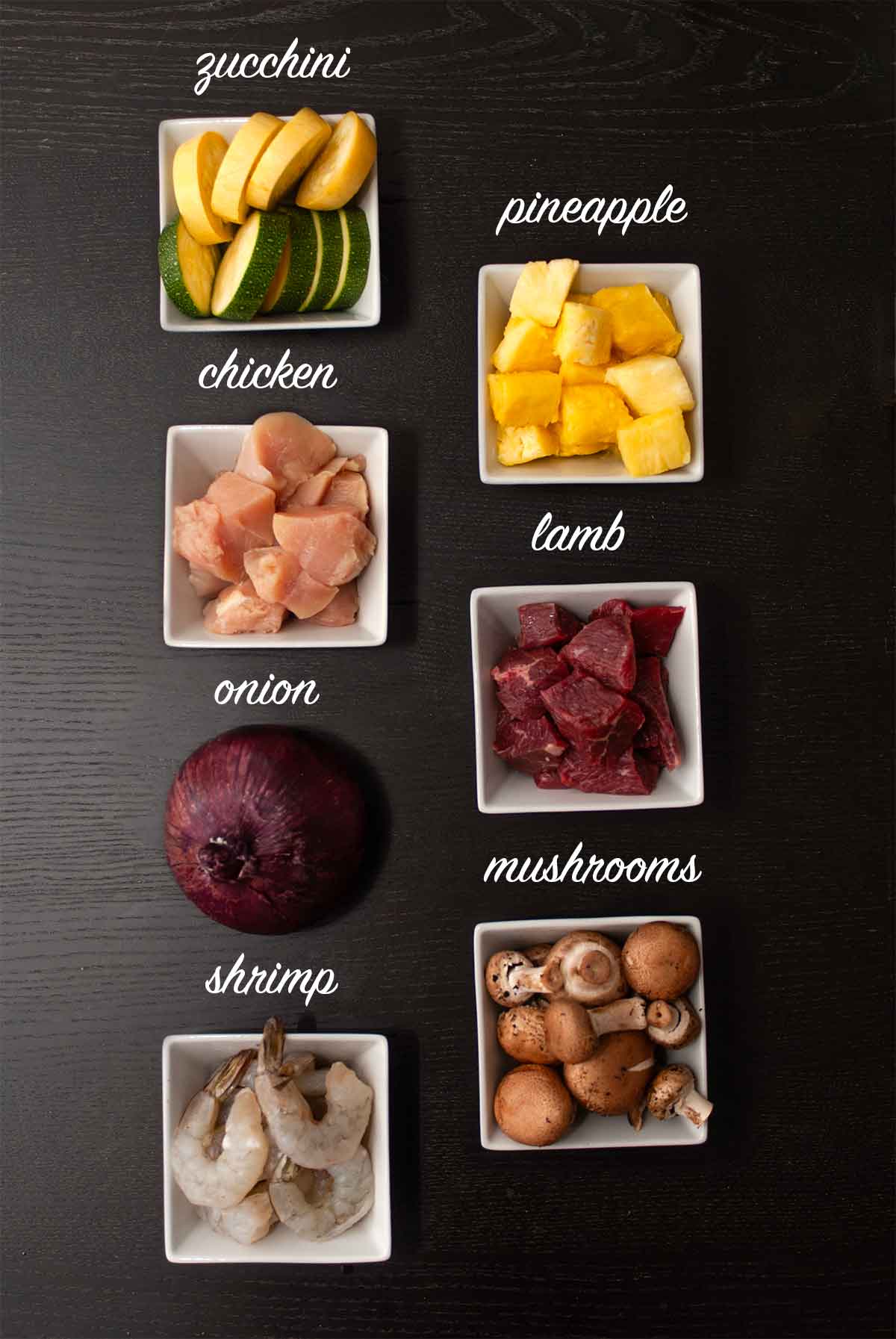 7 ingredients on a table with labels describing what they are.