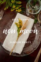 A bundle of tied flowers on a plate with a title that says "An Autumn New Moon Dinner Party."