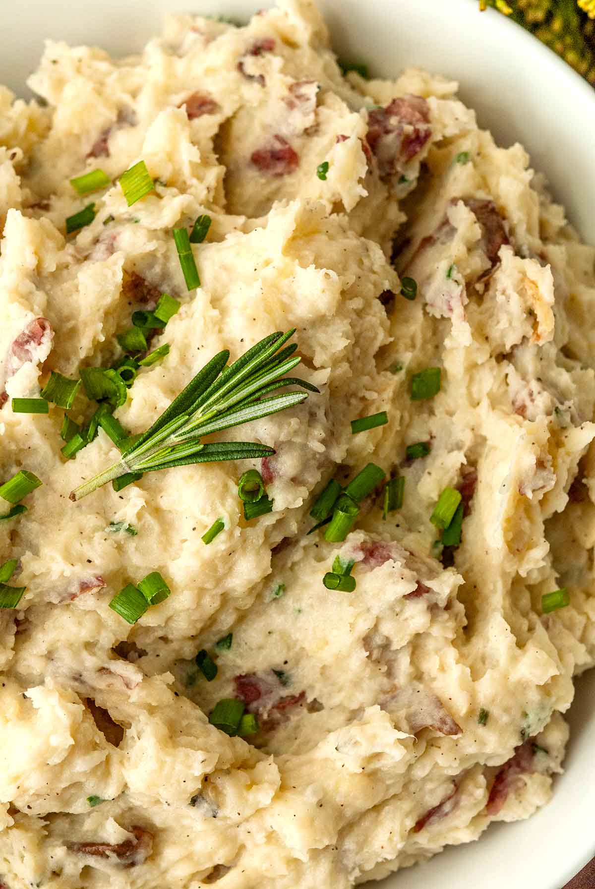 The texture of mashed potatoes in a bowl.