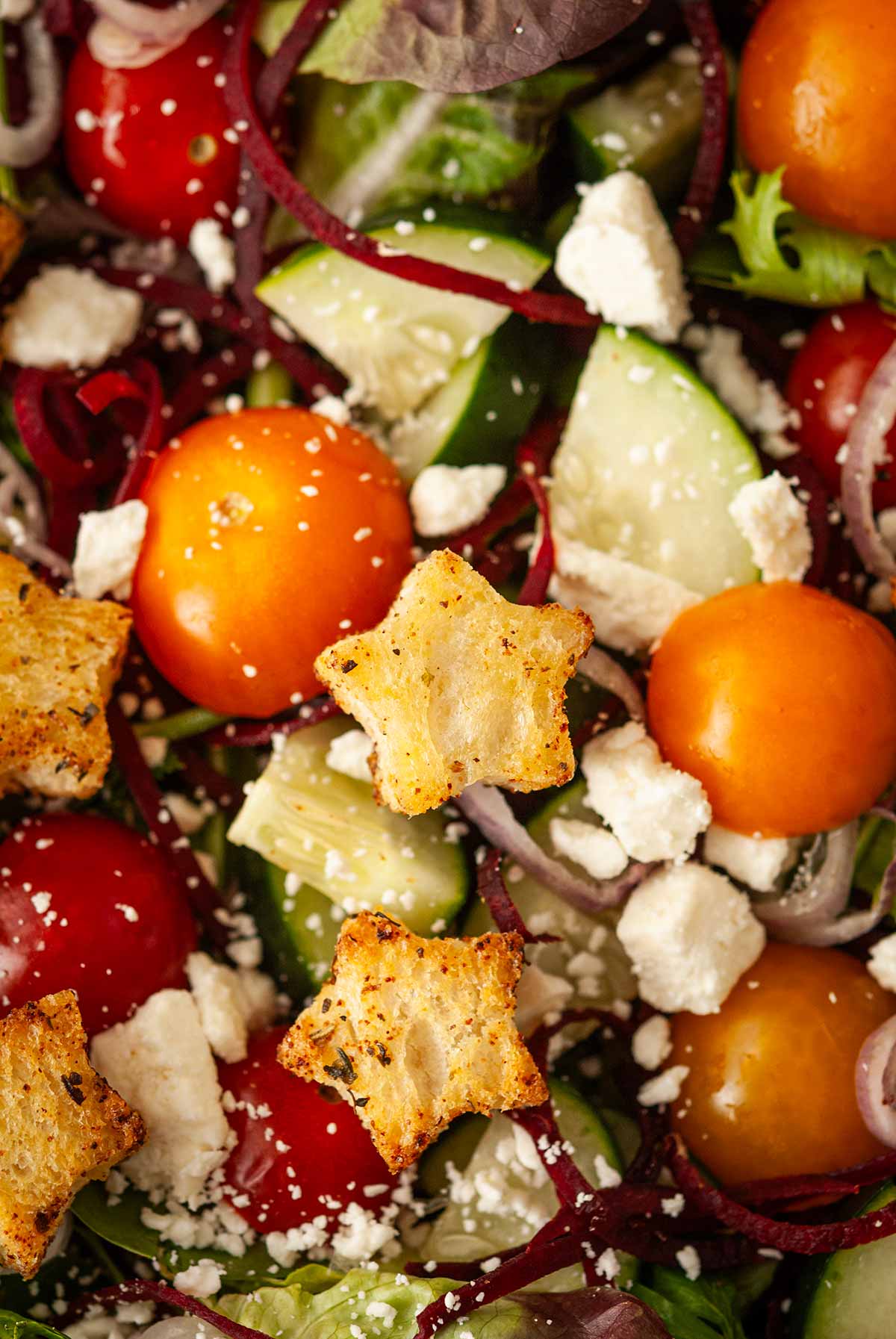 A star-shaped crouton in the center of a salad.