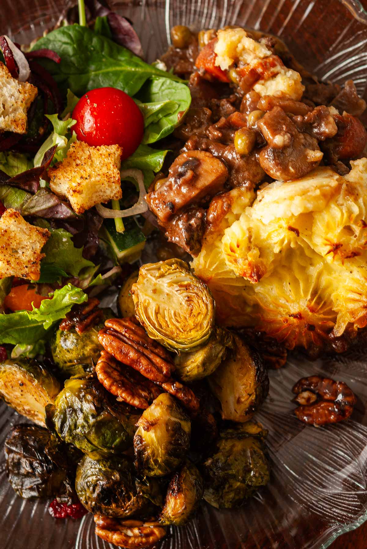 A plate with Christmas dinner on it.