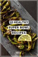Shishito peppers on a slate with lime and a title that says "10 Healthy Super Bowl Recipes."