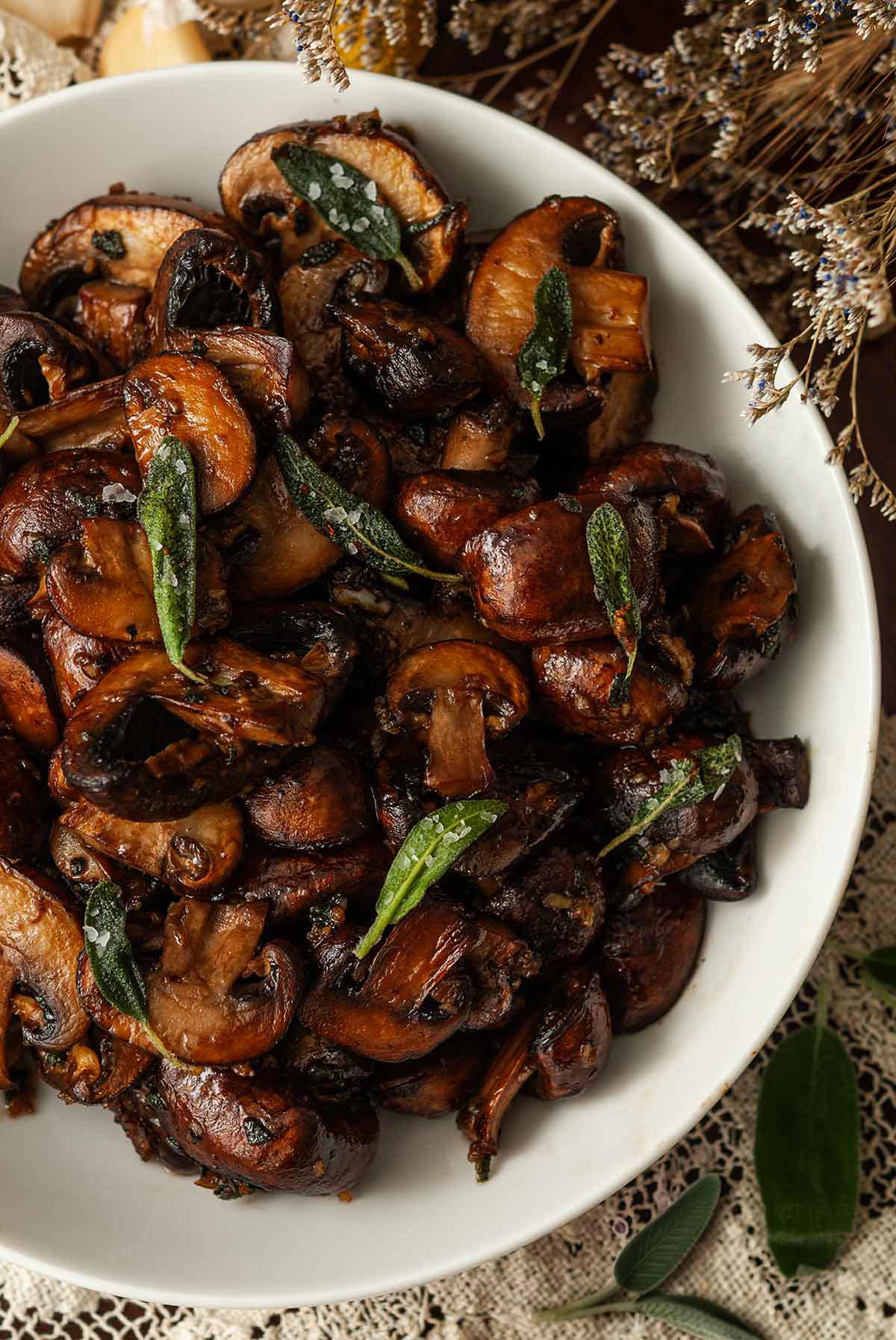 A bowl of sage and garlic mushrooms.