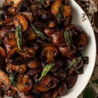 A bowl of sage and garlic mushrooms.