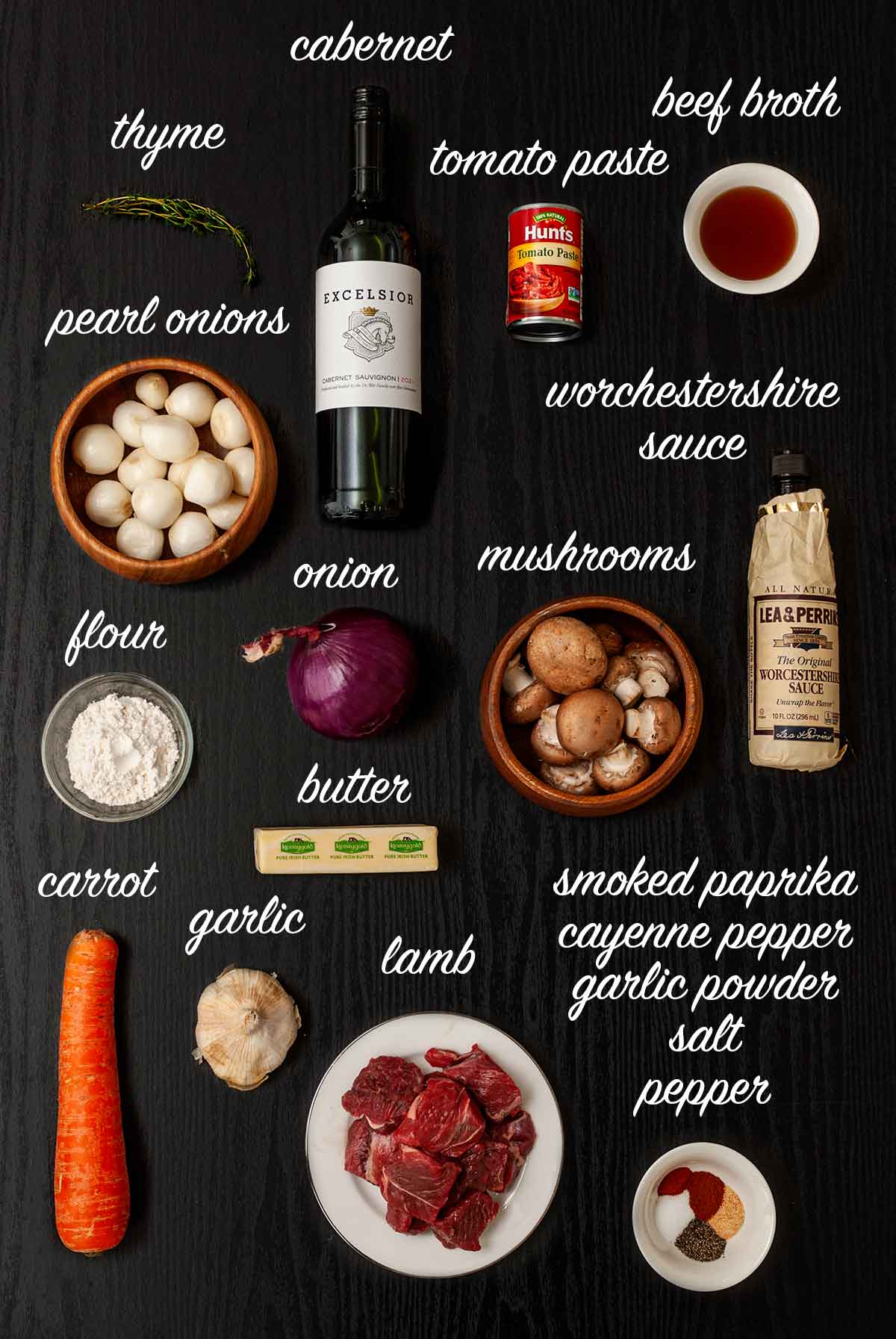 14 ingredients on a table with labels describing what they are.
